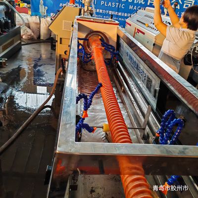 Water Cooling HDPE carbon spiral pipe machine specialized in Pe Pipe production providing performance and easy operation
